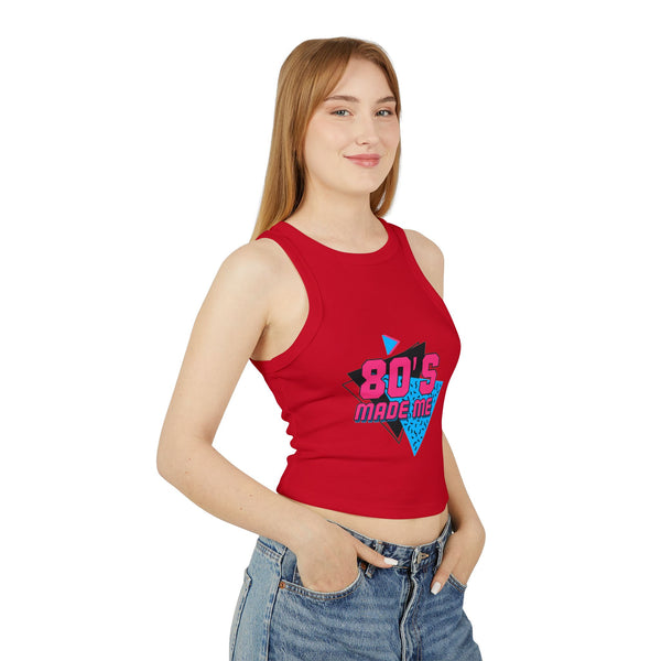 A close-up shot of the "80's Made Me" graphic print on the tank top, highlighting the vibrant retro font and design.